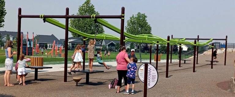 Discovery Park, Meridian Idaho, children playing on the zipline.