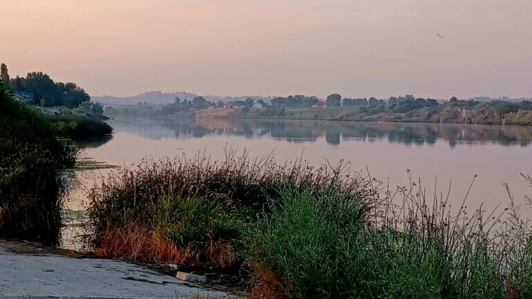 Marsing boat launch area along the Snake River with wildfire smoke creating a hazy sky in Marsing, Idaho.