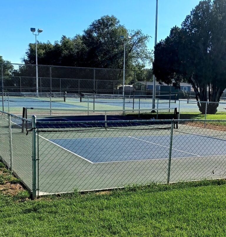 Fenced tennis courts at Richard Aguirre Park Fenced tennis courts at Richard Aguirre Park
