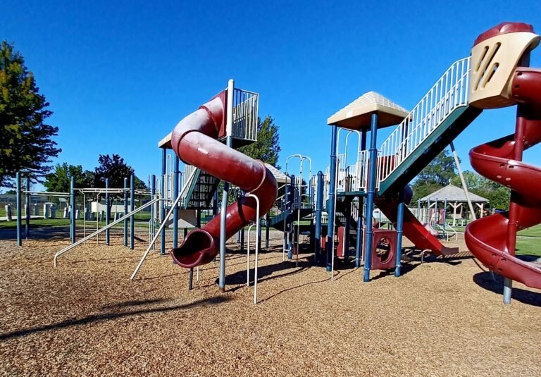 Large playground with red slides at Richard Aguirre Park Large playground with red slides at Richard Aguirre Park